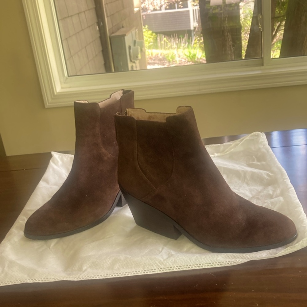 Brown suede,  lightly worn. Extremely comfortable.  Like Eileen Fisher clothes
